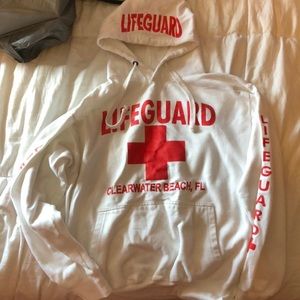 White lifeguard sweatshirt.